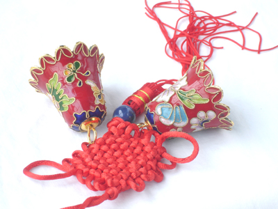 pair of red cloisonne Christmas bells