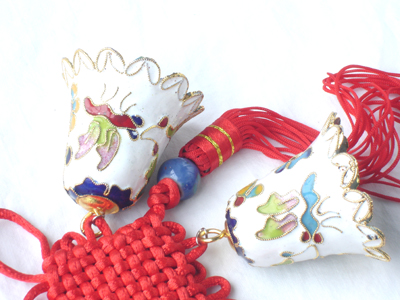 pair of white cloisonne Christmas bells