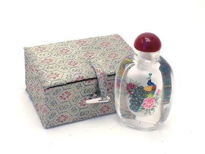 Peacocks inside painting snuff bottle