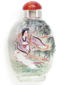 beautiful women with swing and umbrella painting snuff bottle